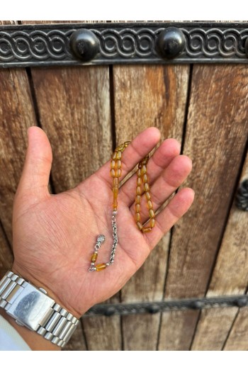 alpaka püsküllü açık yeşil renkli minik taneli bilek boy ateş kehribar